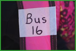 Bus number on backpack strap